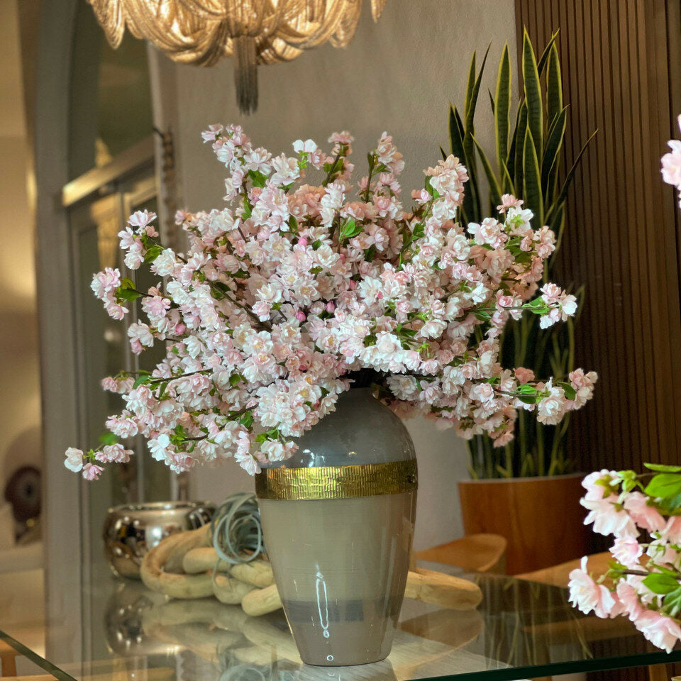 "Goddess" vase with pink cherry blossoms