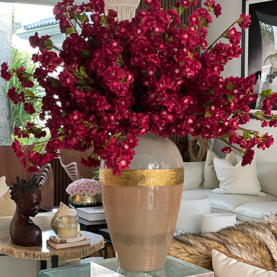 "Goddess" vase with burgundy cherry blossoms