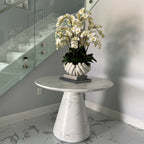 White Phalaenopsis Orchids in Open Hands Sculpture Pot