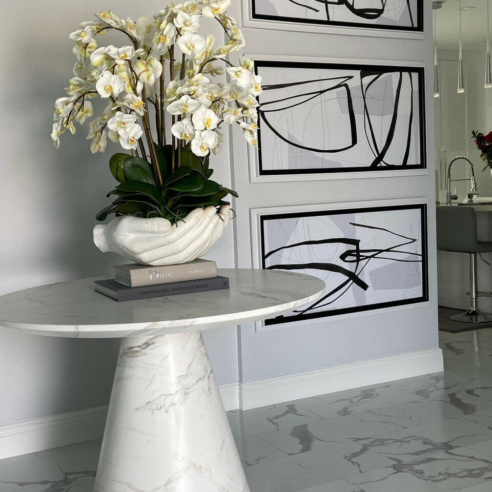 White Phalaenopsis Orchids in Open Hands Sculpture Pot
