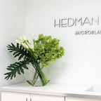 Lunar Vase with Green Cymbidiums and Callas